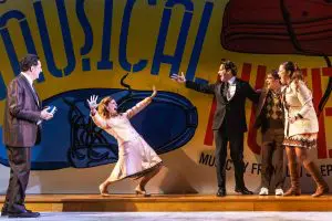 Picture of the cast of "Merrily We Roll Along" in the Village Voice review of the Broadway play.
