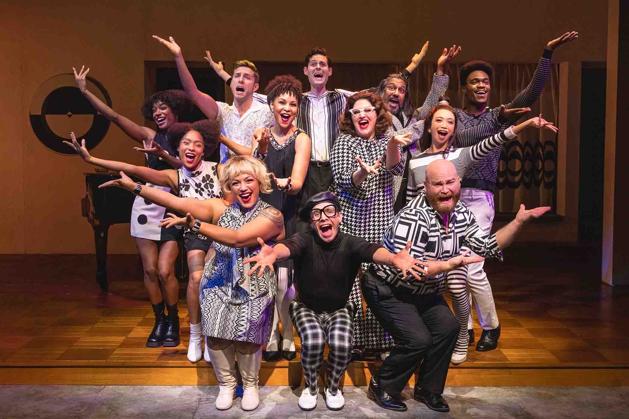 Picture of the cast of "Merrily We Roll Along" in the Village Voice review of the Broadway play.