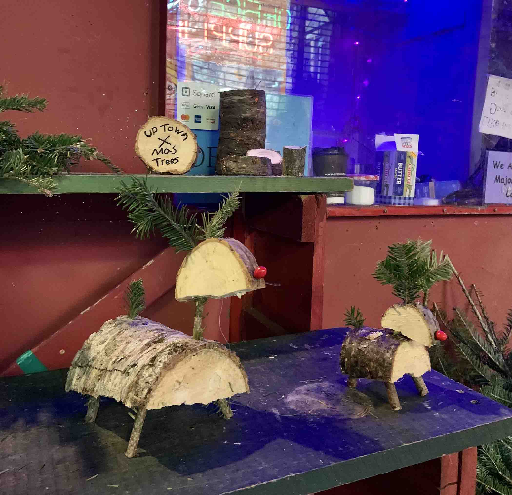 Christmas tree sculptures in an article from the Village Voice.
