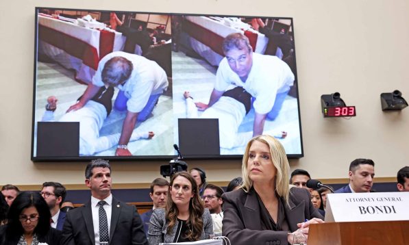 Don’t look back: Attorney General Pam Bondi in front of photos of former Prince Andrew and a young woman or girl with her face redacted, projected on a screen during a hearing before the House Judiciary Committee, on February 11, 2026.
