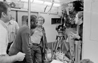 Straphangers: Director Joseph Sargent (center, with glasses) and cinematographer Owen Roizman prepare a close-up of a commuter having a very bad day in “The Taking of Pelham 123.”